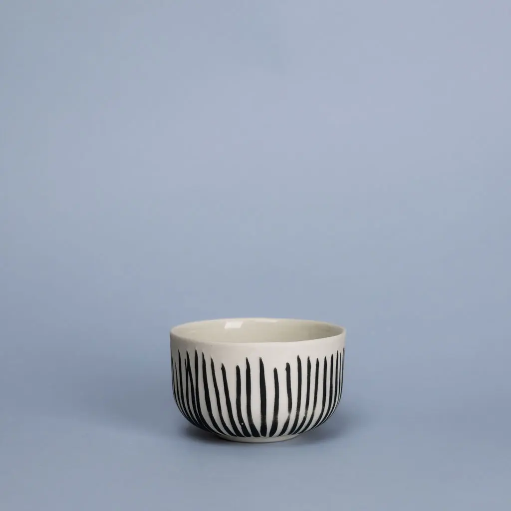 Petite tasse en porcelaine